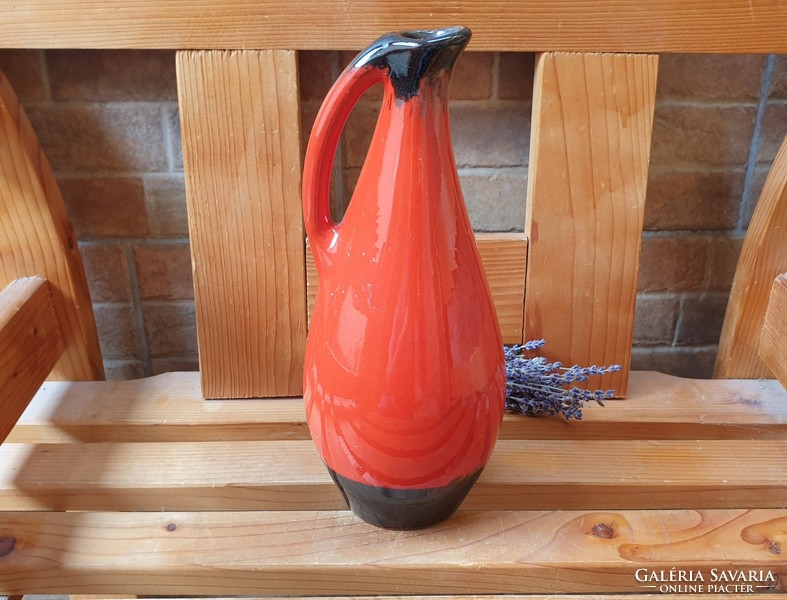 A vase pouring a rare brandy