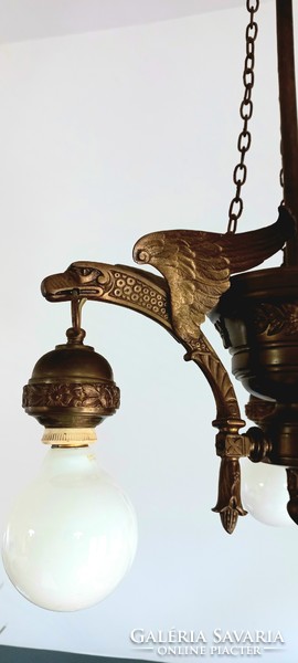 Bronze chandelier with sculptural lanterns