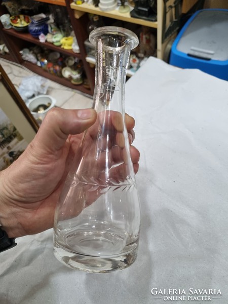 Old polished glass bottle