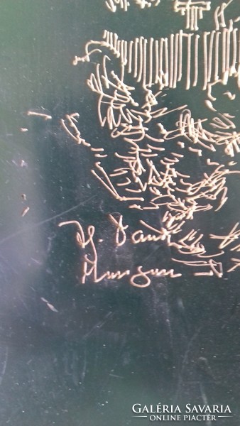 A very heavy copper plate on a wooden board marked with a scratched image, a real copperplate