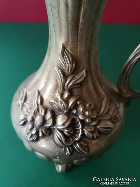 Tin decanter with wonderful shape and decoration.