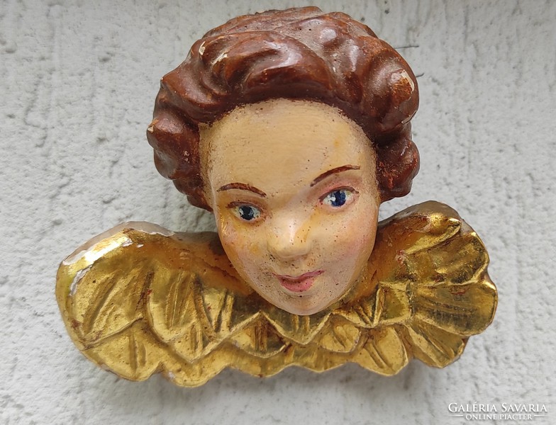 Antique wood carved angel wall hanging. Sculpture painted gilded