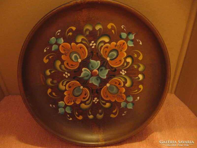 Norwegian old wall ornament on wooden plate, bowl