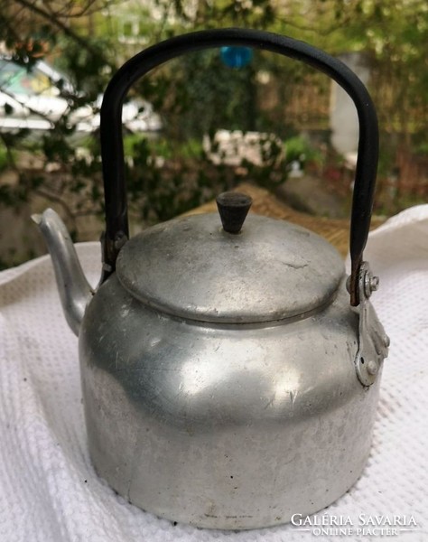 Old aluminum tea jug with pouring jug. Measured: 23 cm.