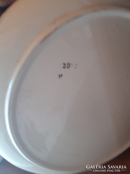 Porcelain washbasin with jug serving.