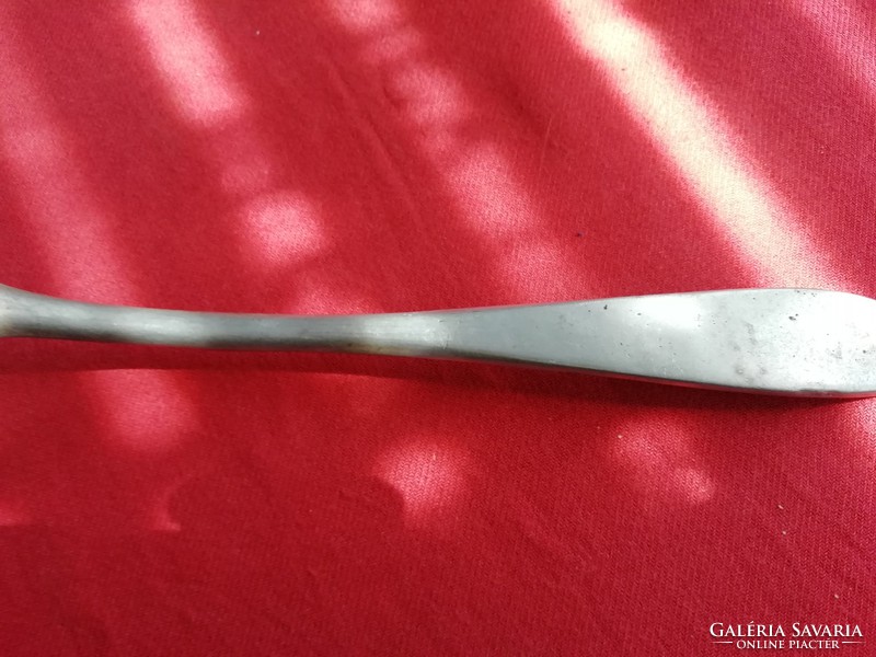Old aluminum spoon