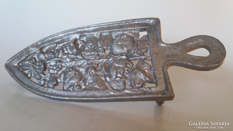 Old iron iron holder with rose pattern, vintage floral ironing board