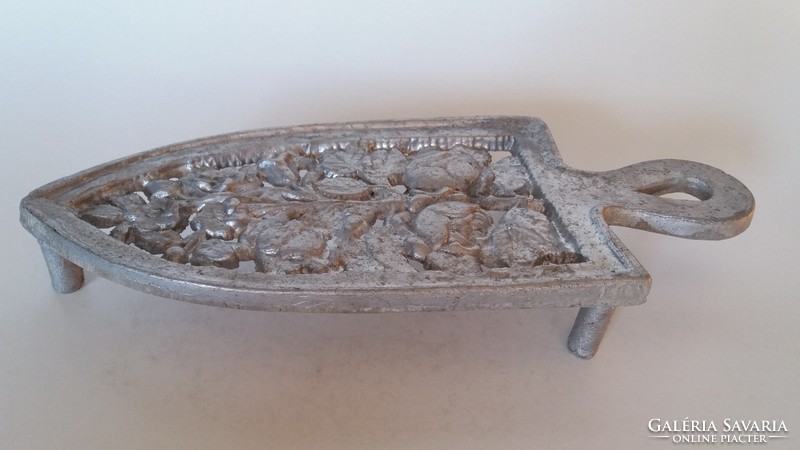 Old iron rosary ironing board with vintage floral soleplate