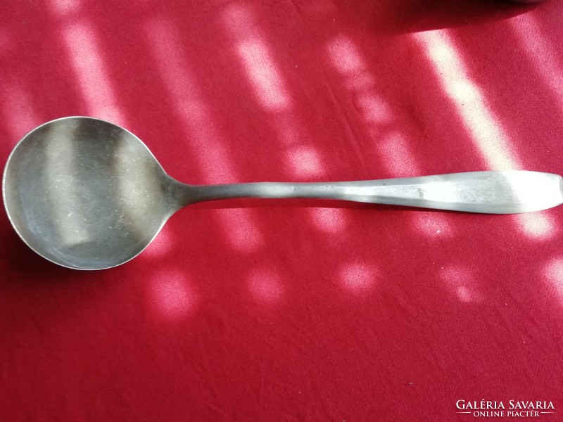 Old aluminum spoon