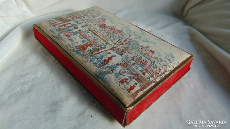 Turn-of-the-century antique box with padded top and silk pattern