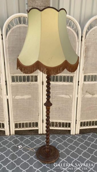 Showy wooden standing lamp