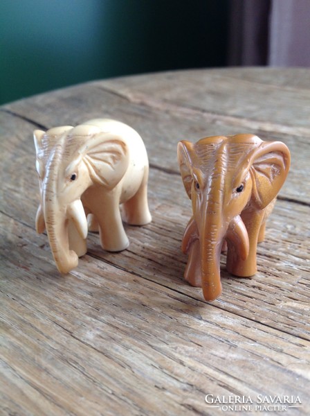 Old hand-carved vinyl record? Elephants in pairs