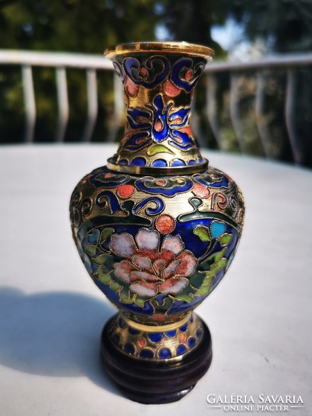 Chinese enamel vase on a gold enamel base