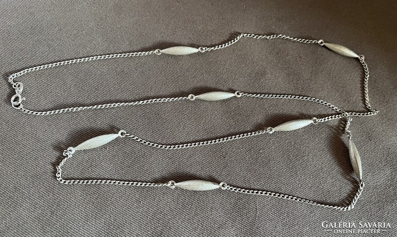 Special long silver necklace
