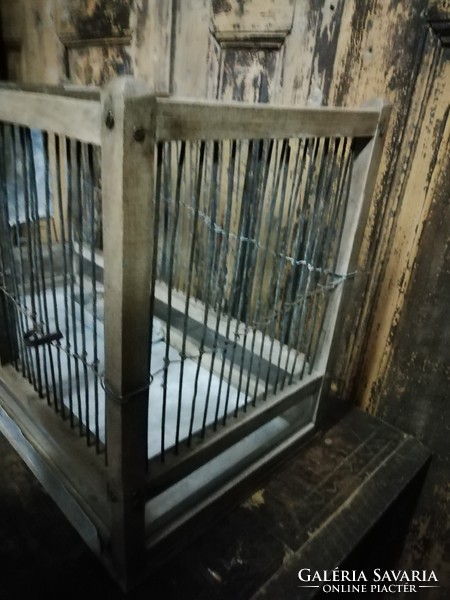 Bird cage, or pet cage, made in the middle of the 20th century, made of hardwood