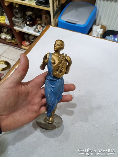 Old painted aluminum figurine