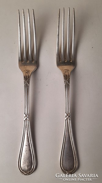 2 silver forks with diana mark