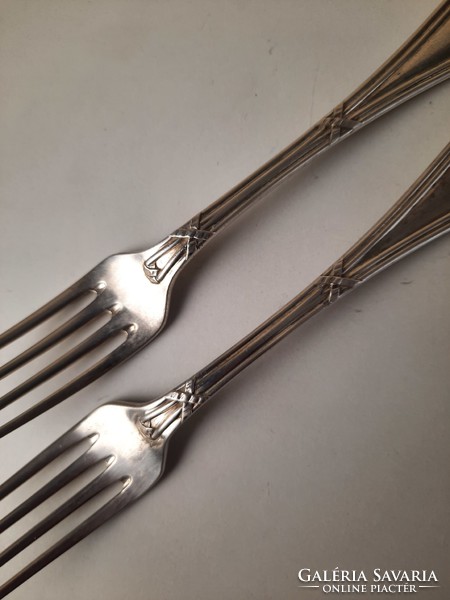 2 silver forks with diana mark
