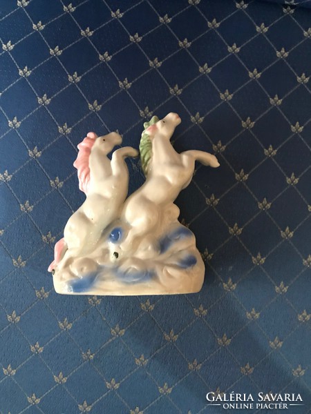 Porcelain equestrian figure, without marking.11X16 cm