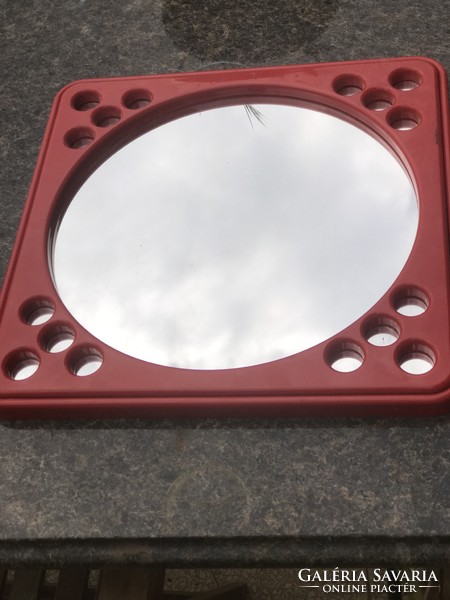 Retro red plastic framed mirror in Finnish, Scandinavian style