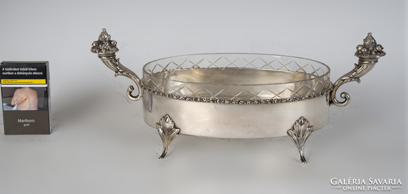 Silver boat bowl with stylized cornucopia pliers