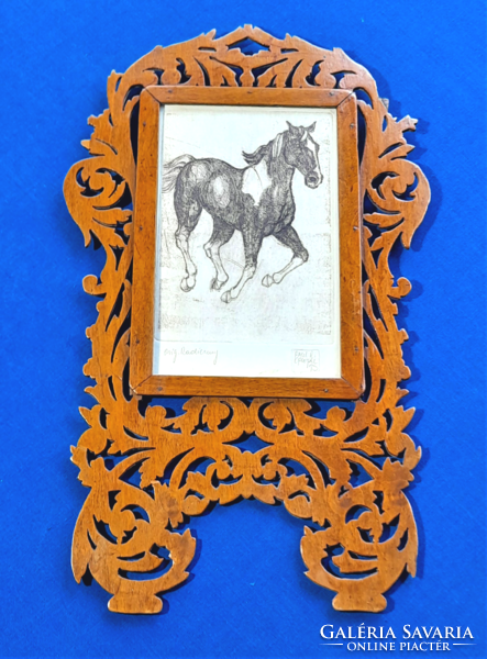 Etching depicting a galloping horse in an antique pierced wooden frame