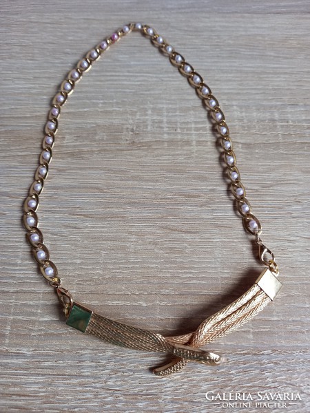 Gold-colored snake necklace