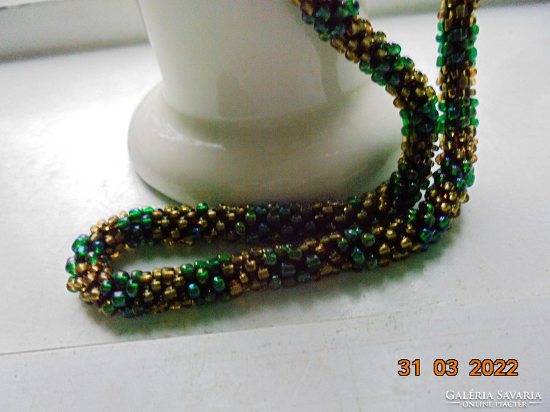 Beaded crochet rope necklaces with lots of tiny antique gold and emerald green play beads