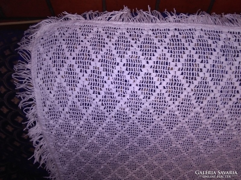 Old, crocheted, round-fringed tablecloth, tablecloth