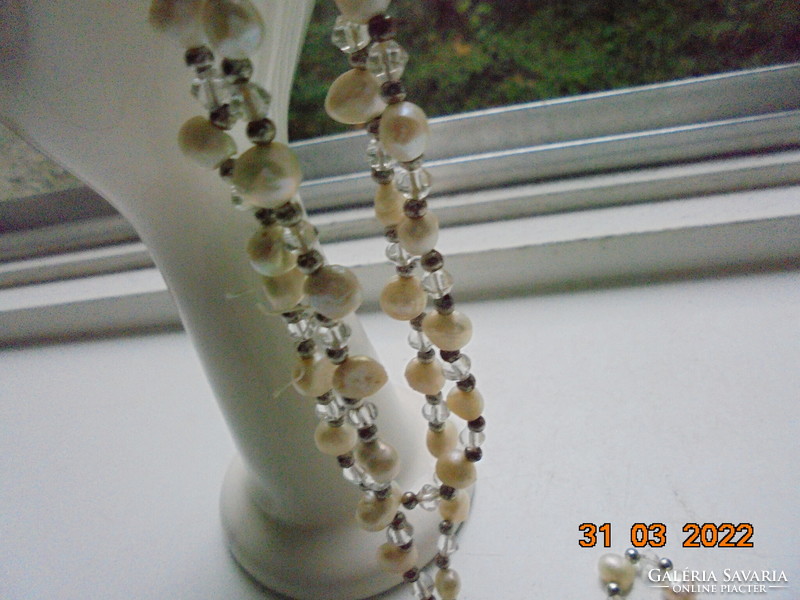 Long real pearl necklace with silver color and transparent intermediate beads