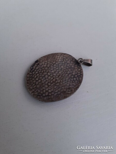 Beautiful silver plated pendant made with retro handwork