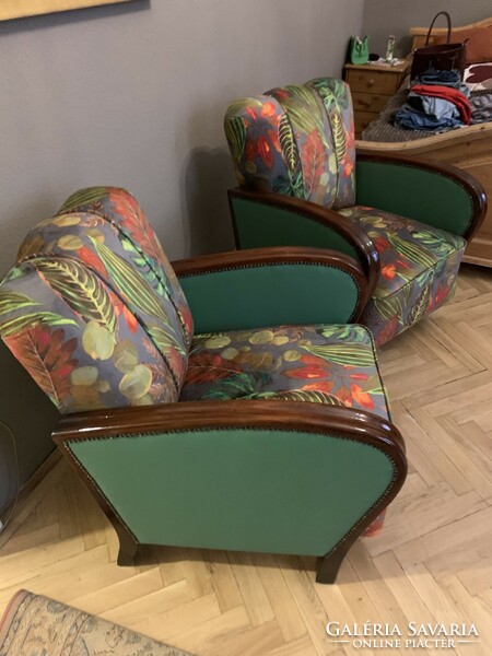 Refurbished and restored art deco armchairs with a jungle pattern