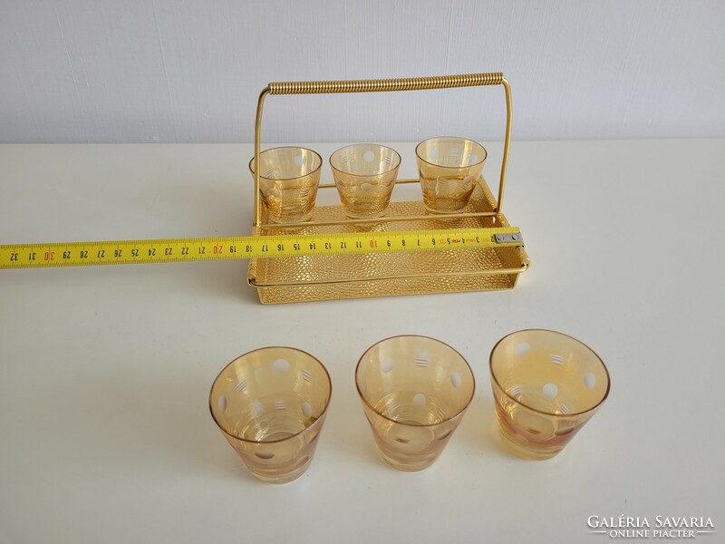 Retro old gold colored polka dot drink set with glass holder for mid century