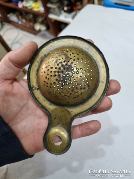 Old metal tea strainer