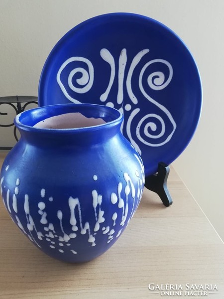 Old blue and white ceramic vase and wall plate