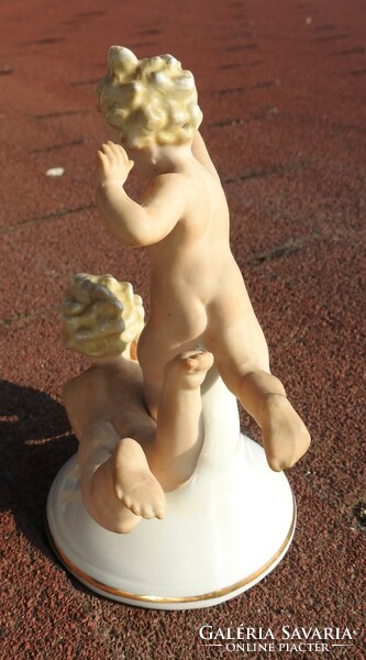 Antique German eagle figure: naked children playing ball