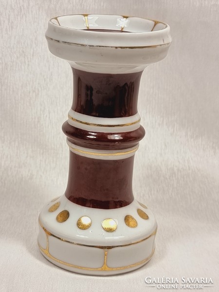 Rare raven house porcelain column shaped candle holder with gilded decoration, xx.S second half.