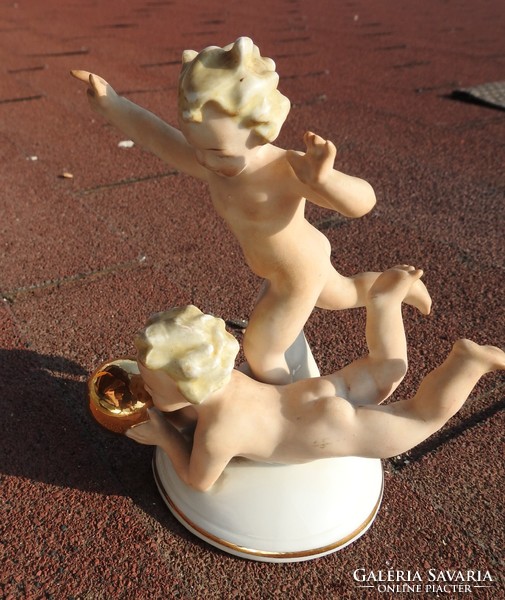 Antique German eagle figure: naked children playing ball