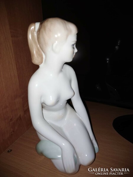 Porcelain sitting girl figure for sale