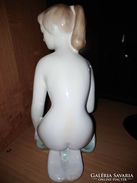 Porcelain sitting girl figure for sale