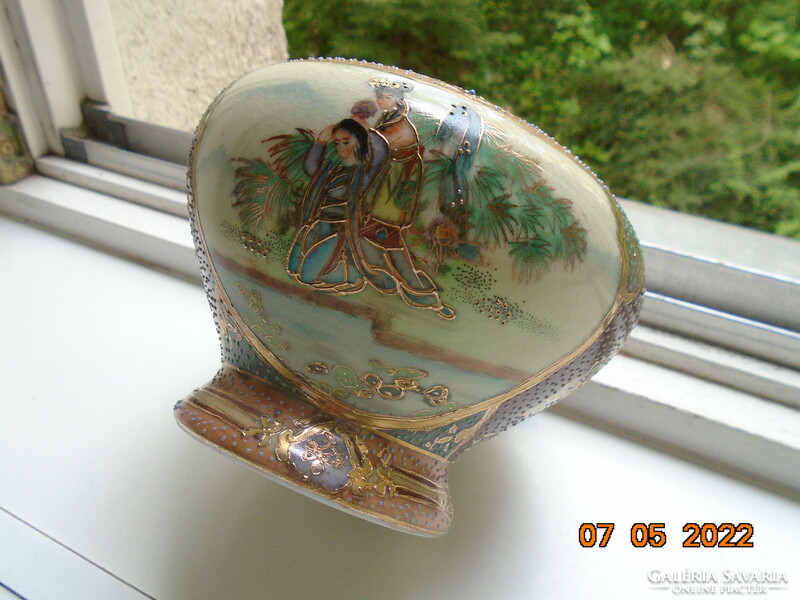 A hand-painted Chinese satsuma vase with a lid featuring two life portraits with ornate gold embossed enamel patterns