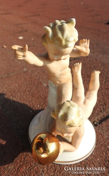 Antique German eagle figure: naked children playing ball