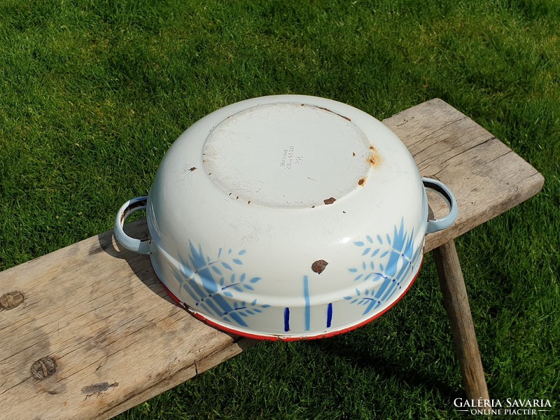 Old vintage enameled large bowl with legs