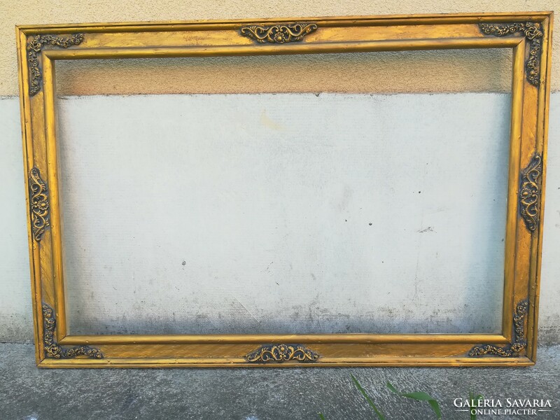 Beautiful wooden picture frame. Nest: 80x50 cm. Color: gold, antique.