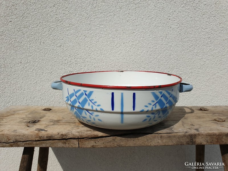 Old vintage enameled large bowl with legs