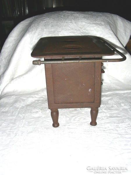 Antique baby stove / slightly parceled exam work