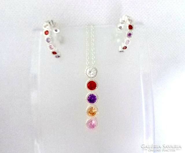 Set of colorful crystal pendants, chains and earrings