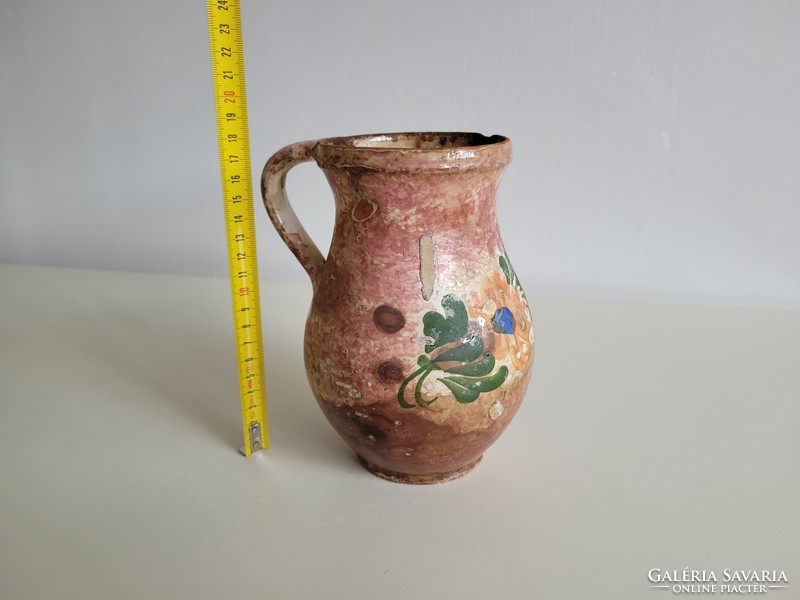 Old vintage folk earthenware milk jug flower pattern glazed vessel spout jug earthenware jug