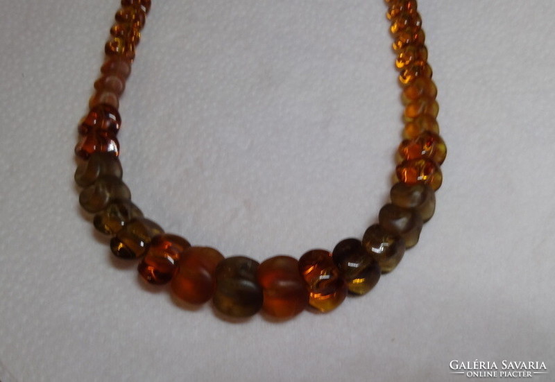 Orex antique wonderful unique beautifully crafted amber necklaces bought in a jewelry store.