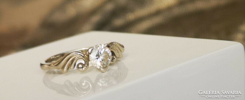 'Angel Wing' gold ring with internally flawless if-g diamond!